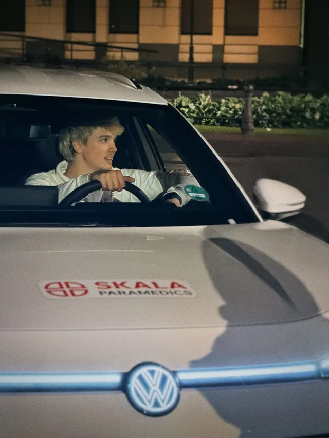 Medic at the wheel, the bonnet with SKALA logo in the foreground